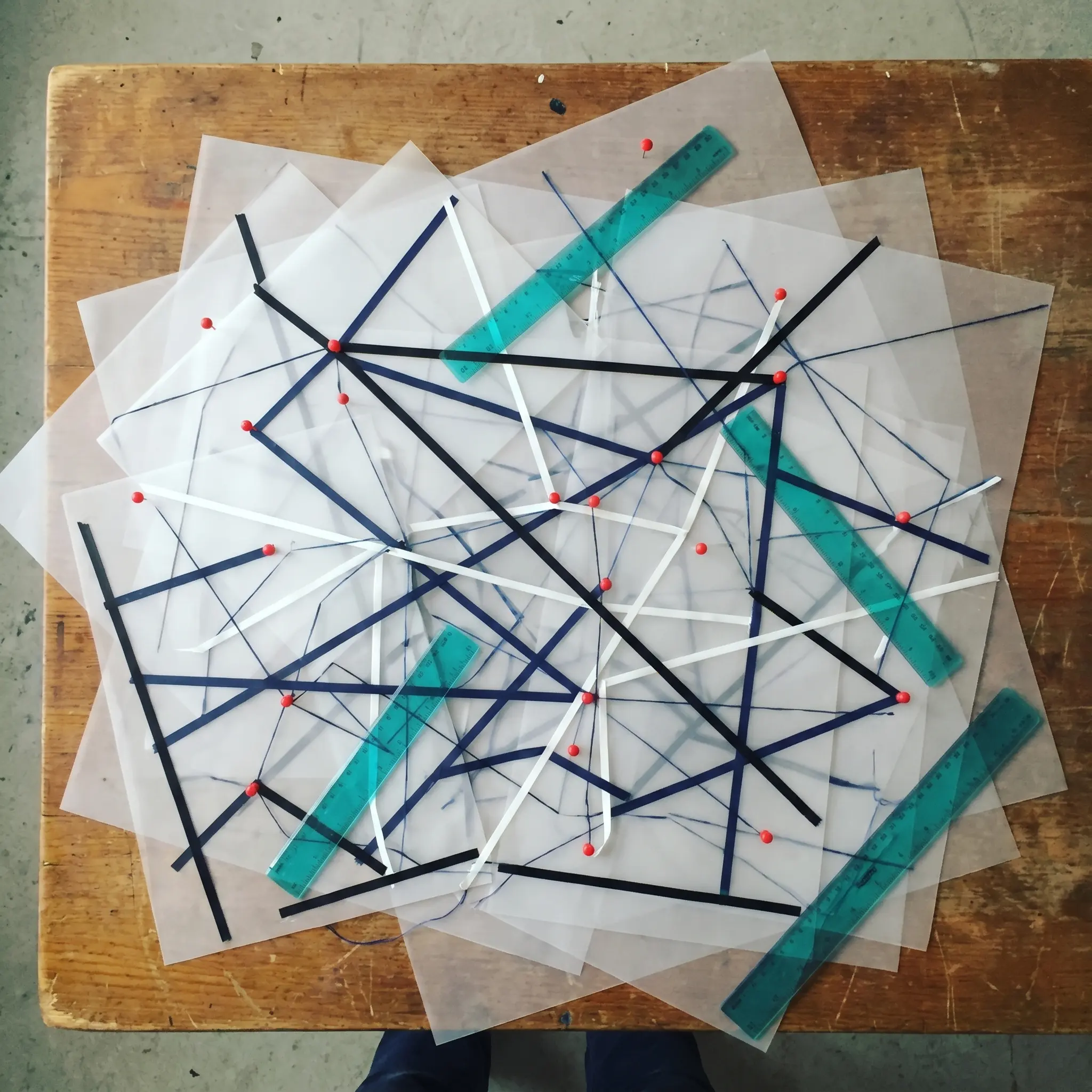 Transparent sheets and routing marks used to register ambiguity in LLM vocabulary
